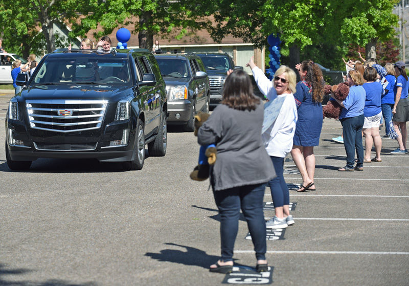 Teachers hold parade for students at Houston Academy